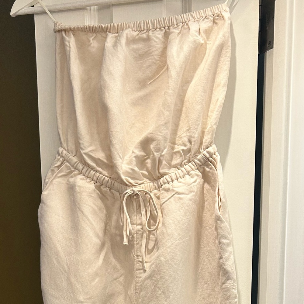 Cream sleeveless jumpsuit